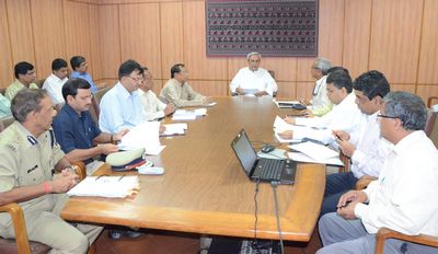 Chief Minister Shri Naveen Patnaik reviewing flood preparedness at a high level meting at SecretariatDate-27-Jul-2012